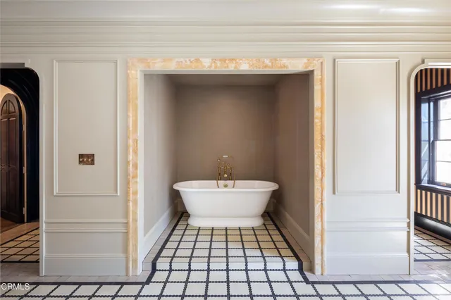 a front view of a house with a garage