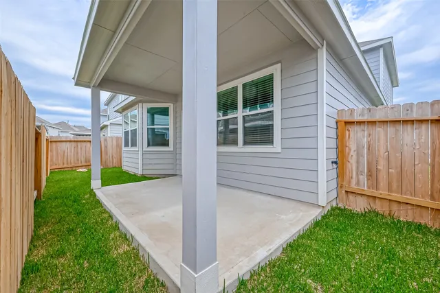 a view of a back yard of the house