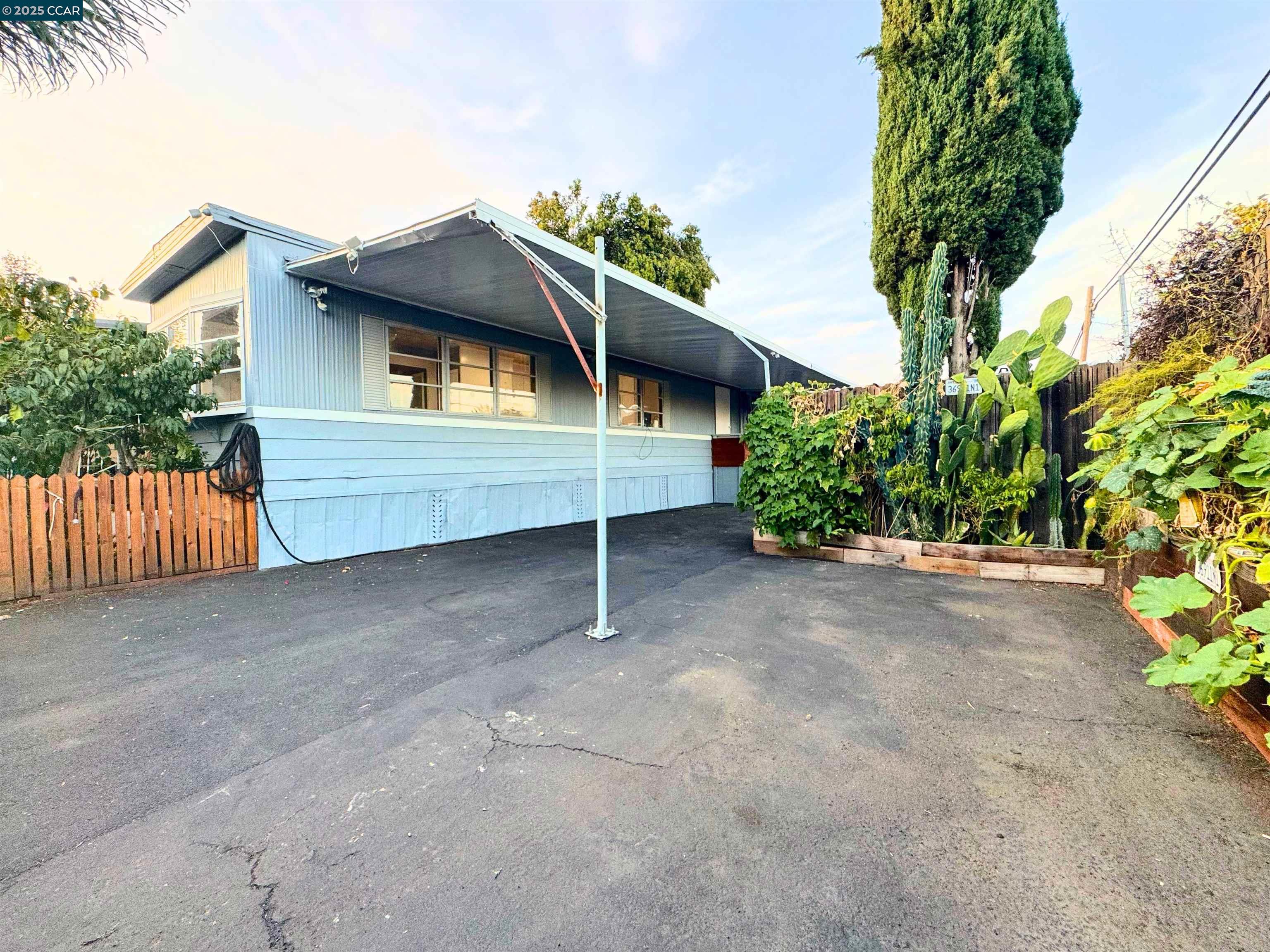 55 Pacifica Avenue, Unit 110 Bay Point, CA 94565 - Photo 2 of 20 a house view with a garden space