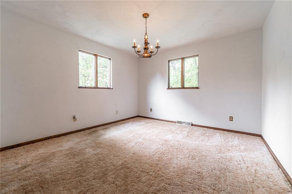 144 Cooper Road Cabot, PA 16023 - Photo 15 of 25 an empty room with windows
