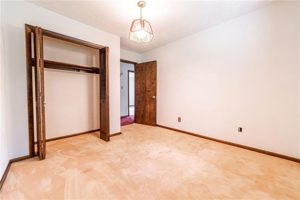 144 Cooper Road Cabot, PA 16023 - Photo 16 of 25 a view of an empty room with a window