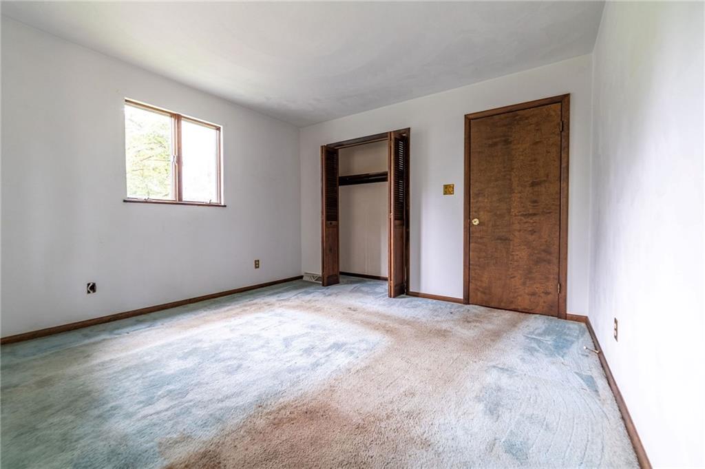 144 Cooper Road Cabot, PA 16023 - Photo 18 of 25 an empty room with windows