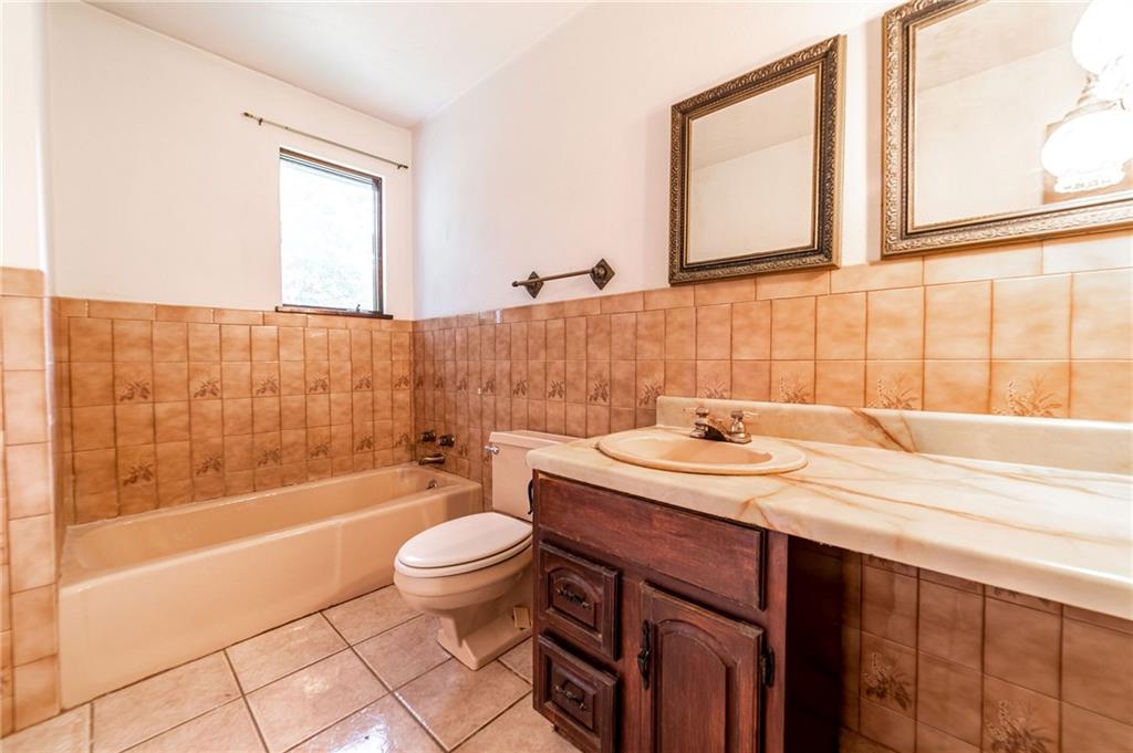 144 Cooper Road Cabot, PA 16023 - Photo 21 of 25 a bathroom with a sink a toilet and shower
