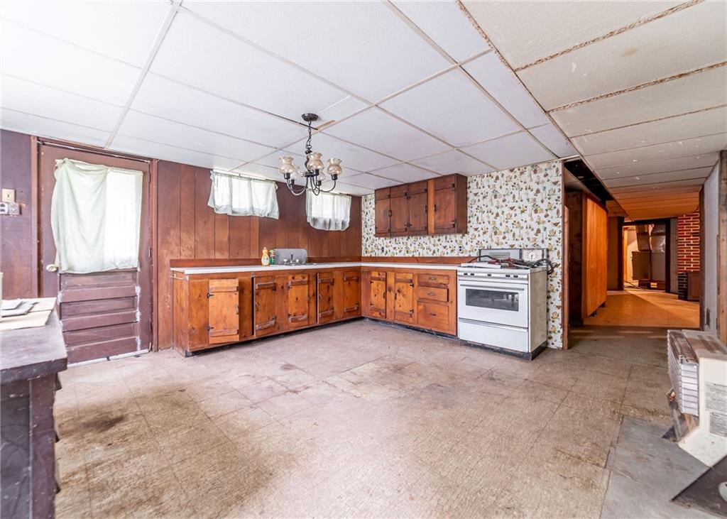144 Cooper Road Cabot, PA 16023 - Photo 23 of 25 a view of a room with kitchen and window
