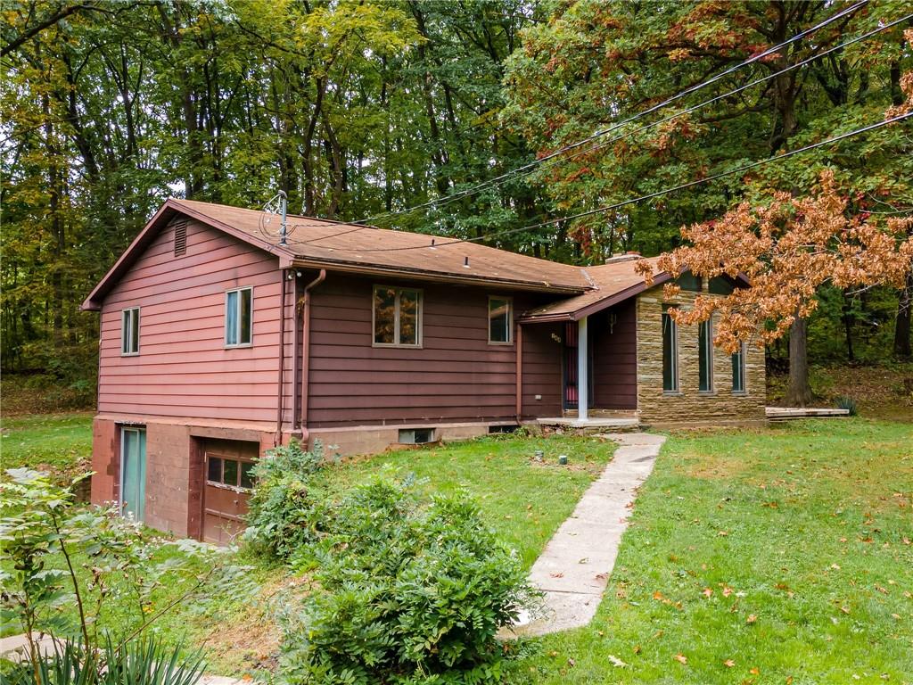 144 Cooper Road Cabot, PA 16023 - Photo 3 of 25 a view of a house with a yard