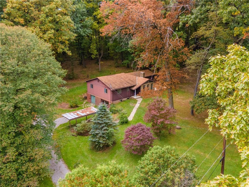 144 Cooper Road Cabot, PA 16023 - Photo 4 of 25 a view of a house with a yard