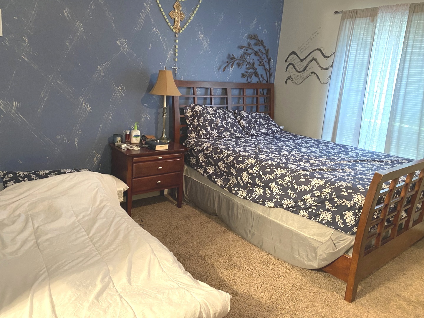 2038 North Rand Road, Unit 212 Palatine, IL 60074 - Photo 15 of 27 a bedroom with a bed and window