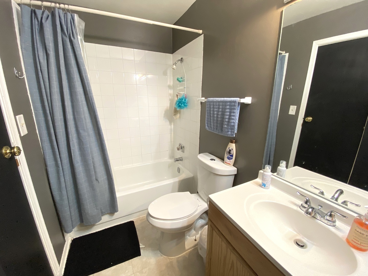 2038 North Rand Road, Unit 212 Palatine, IL 60074 - Photo 23 of 27 a white toilet sitting next to a bathroom sink