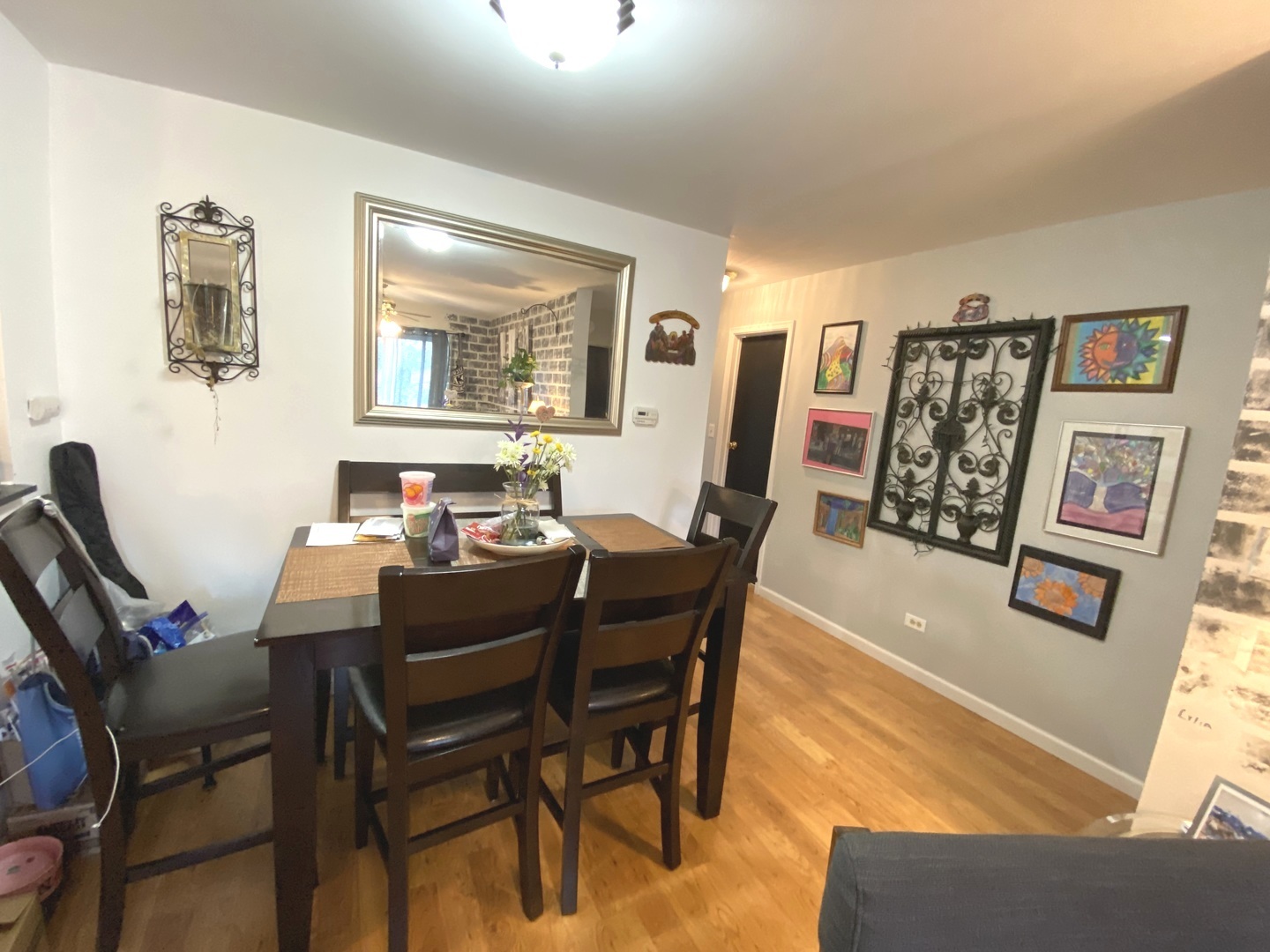 2038 North Rand Road, Unit 212 Palatine, IL 60074 - Photo 6 of 27 a view of a dining room with furniture