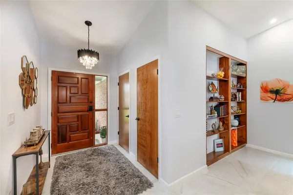 a view of livingroom with furniture and closet