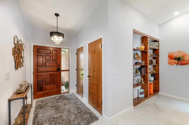 a view of livingroom with furniture and closet