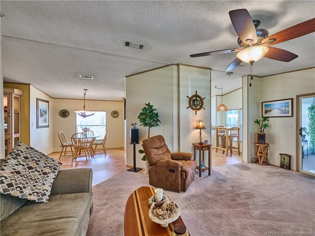 a kitchen with a sink cabinets and window
