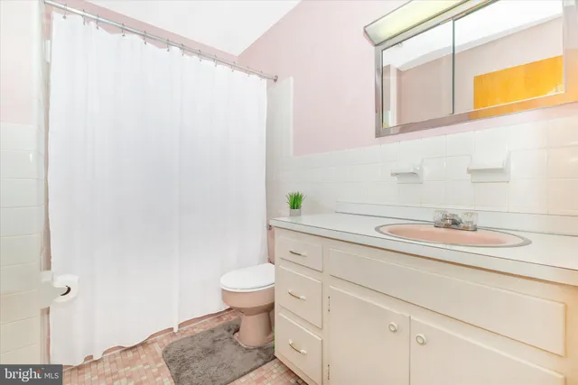 a living room with furniture and rug