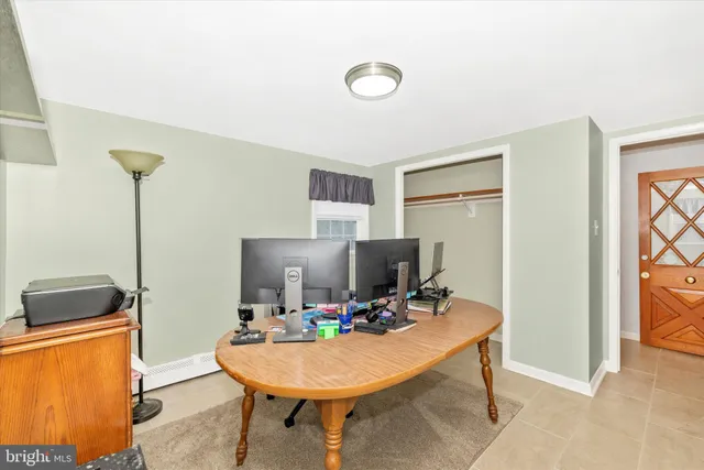 a bathroom with a sink toilet and mirror