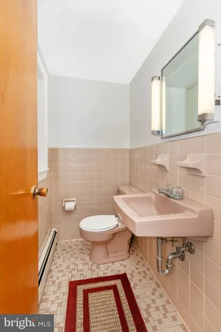 a front view of house with yard and swimming pool