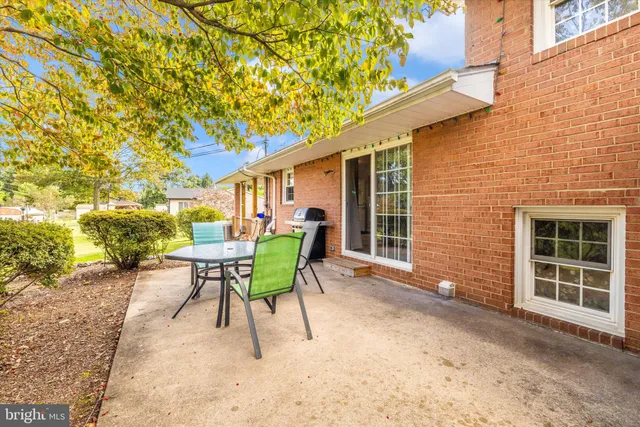 a view of a balcony with wooden floor