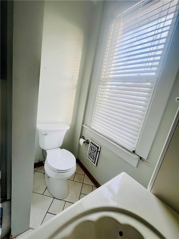 1816 Monroe Street Pittsburgh, PA 15218 - Photo 13 of 21 a bathroom with a toilet and a sink