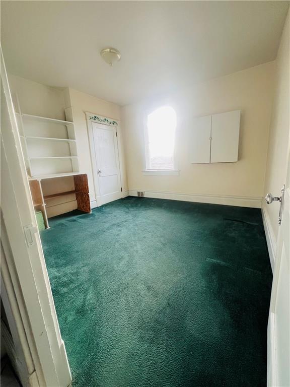 1816 Monroe Street Pittsburgh, PA 15218 - Photo 18 of 21 a view of room with window and hardwood floor