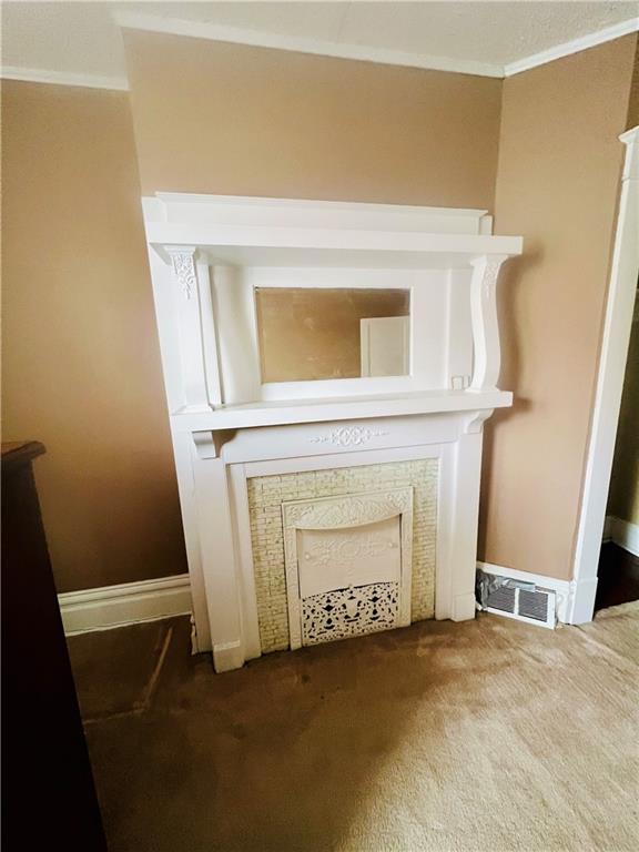 1816 Monroe Street Pittsburgh, PA 15218 - Photo 19 of 21 a view of an entryway with a fireplace
