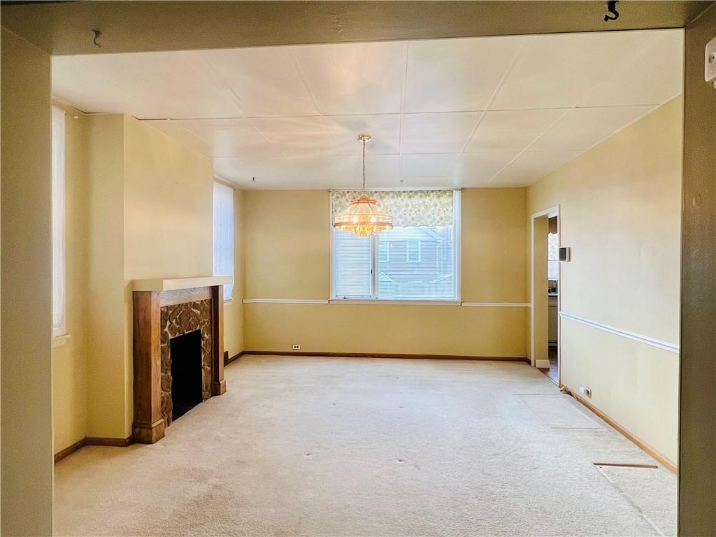 1816 Monroe Street Pittsburgh, PA 15218 - Photo 2 of 21 a view of empty room with a fireplace