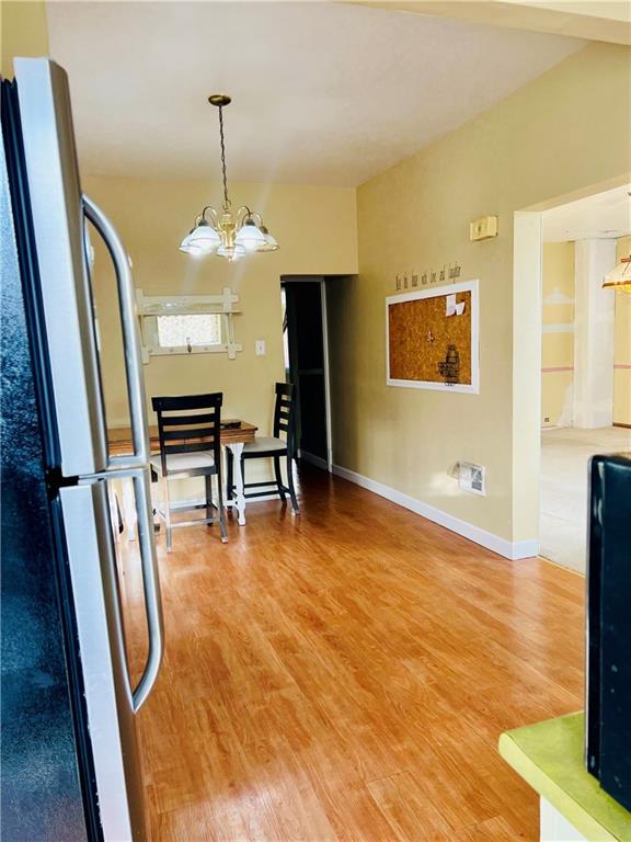 1816 Monroe Street Pittsburgh, PA 15218 - Photo 6 of 21 a view of a livingroom with furniture wooden floor and staircase