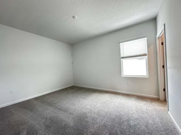 a utility room with a window dryer and washer