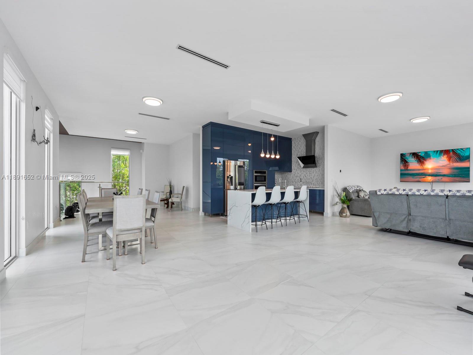 474 Bahia Honda Road Key Largo, FL 33037 - Photo 11 of 33 a living room with furniture and a table