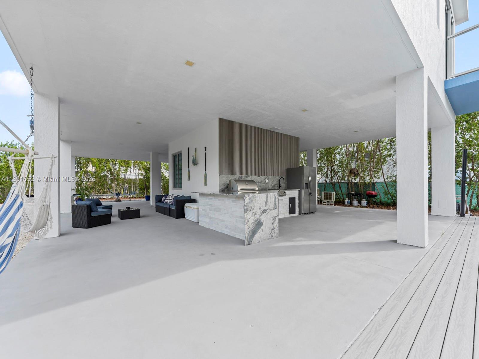 474 Bahia Honda Road Key Largo, FL 33037 - Photo 28 of 33 a view of living room with furniture and garden