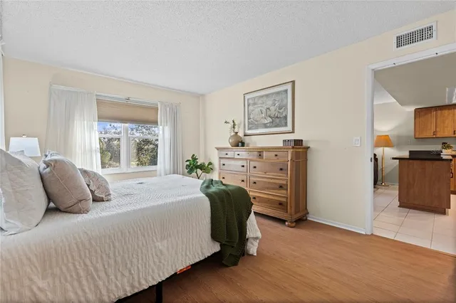 a bedroom with a bed and furniture