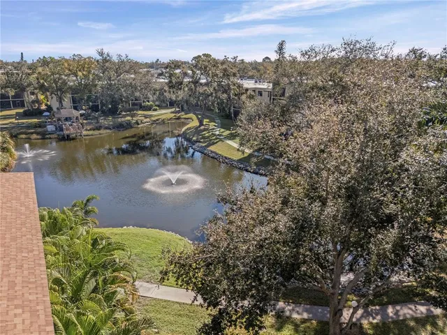 a view of a lake in middle of the town