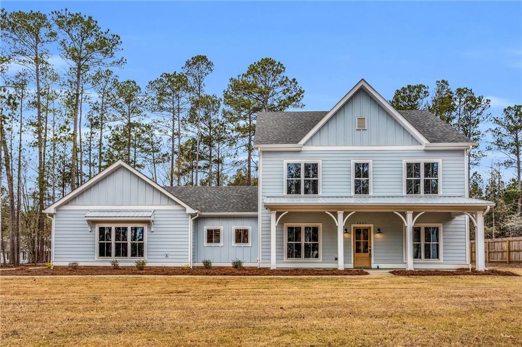 1431 Fairplay Road Rutledge, GA 30663 - Photo 1 of 1 a front view of a house with a yard