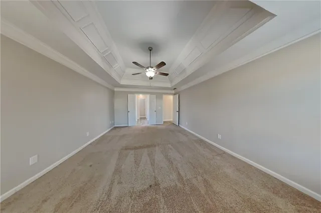 a view of empty room with windows