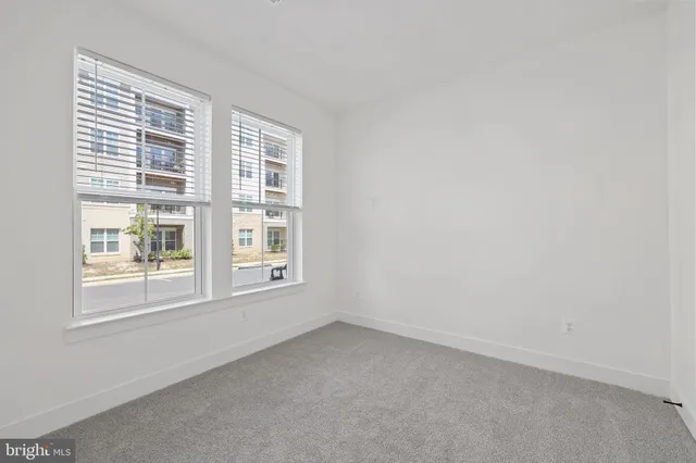 a bathroom with a sink mirror toilet and shower