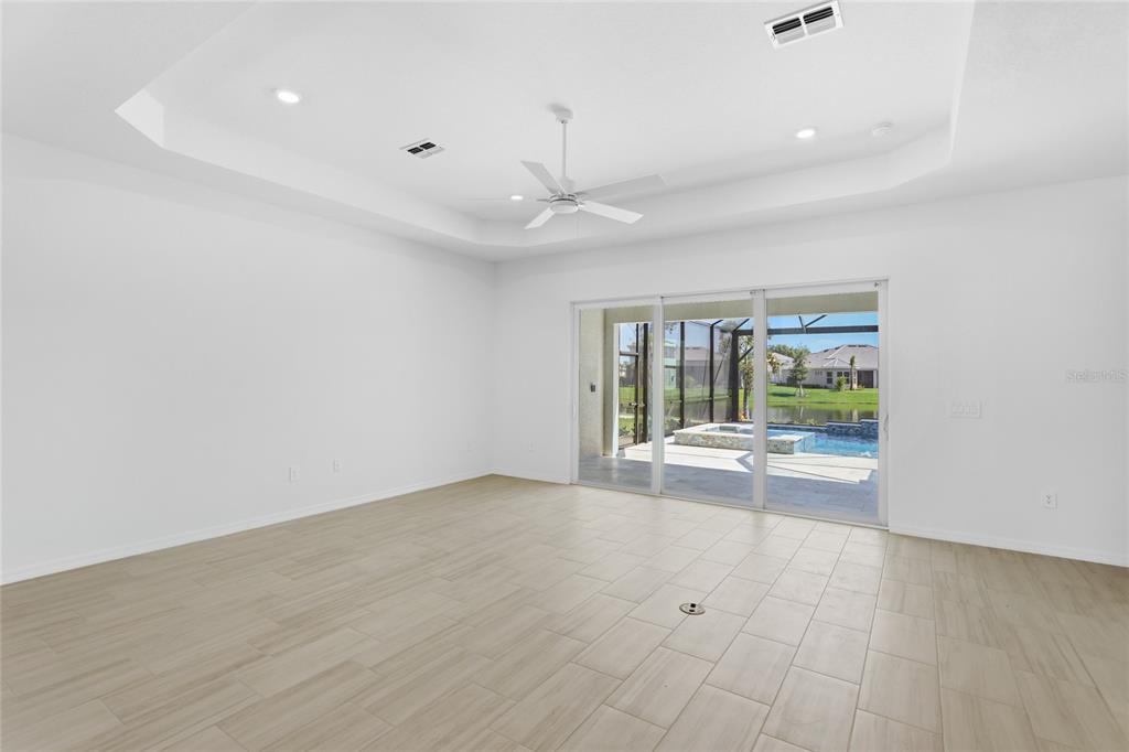 19156 Cherrystone Way Lakewood Ranch, FL 34211 - Photo 6 of 49 a view of an empty room with a window