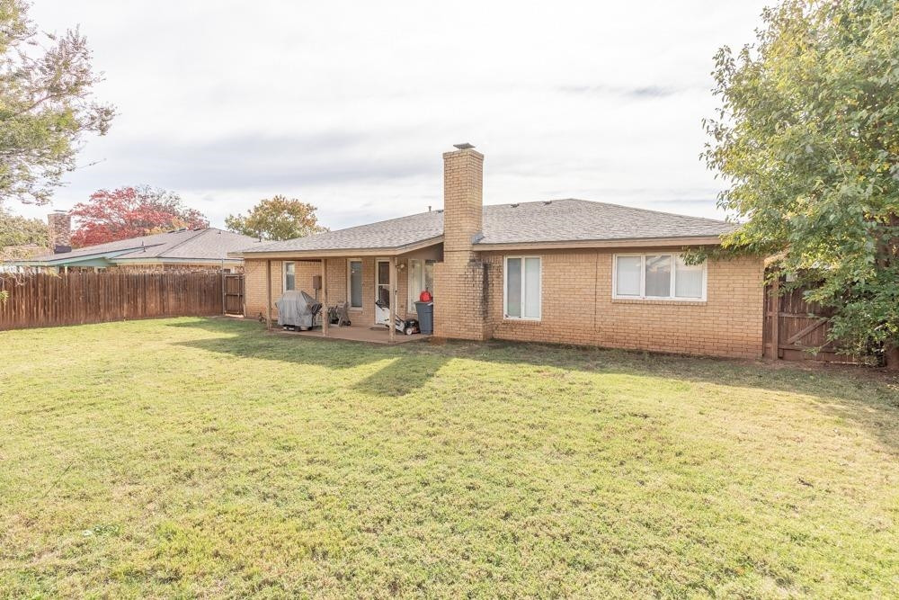 5402 94th Street Lubbock, TX 79424 - Photo 17 of 24 a house with swimming pool in front of it