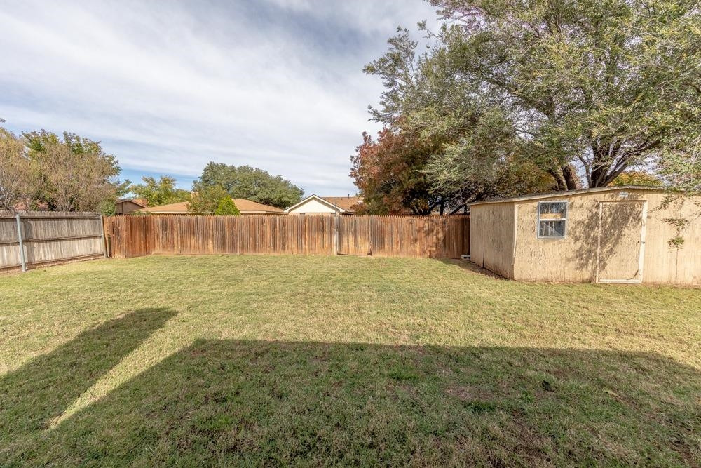 5402 94th Street Lubbock, TX 79424 - Photo 20 of 24 a view of a yard with an outdoor