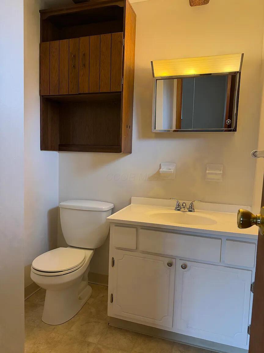 4979 Godown Road, Unit 4981 Columbus, OH 43220 - Photo 9 of 15 half bath in master bedroom