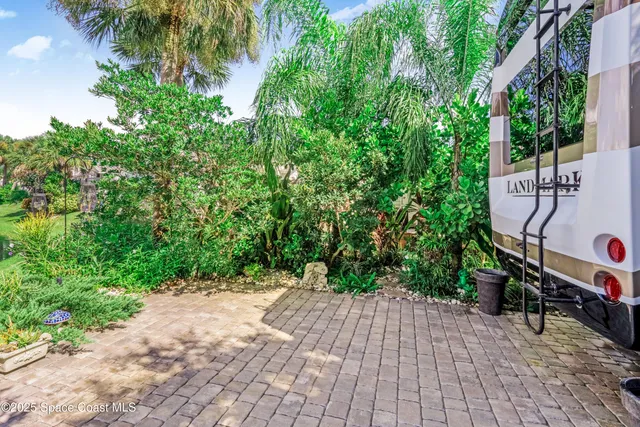 a view of a pathway with a bench