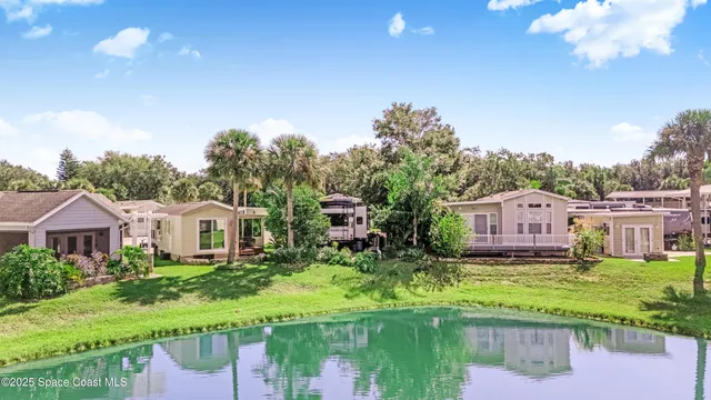 a house with river in front of it