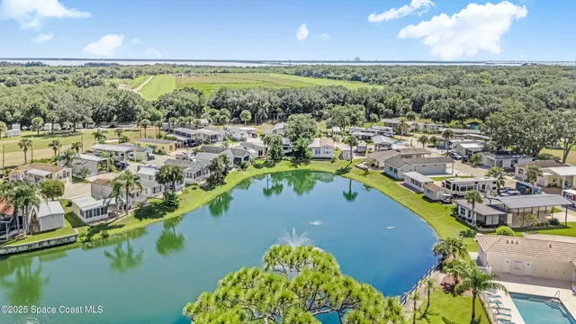 a view of a city with an ocean