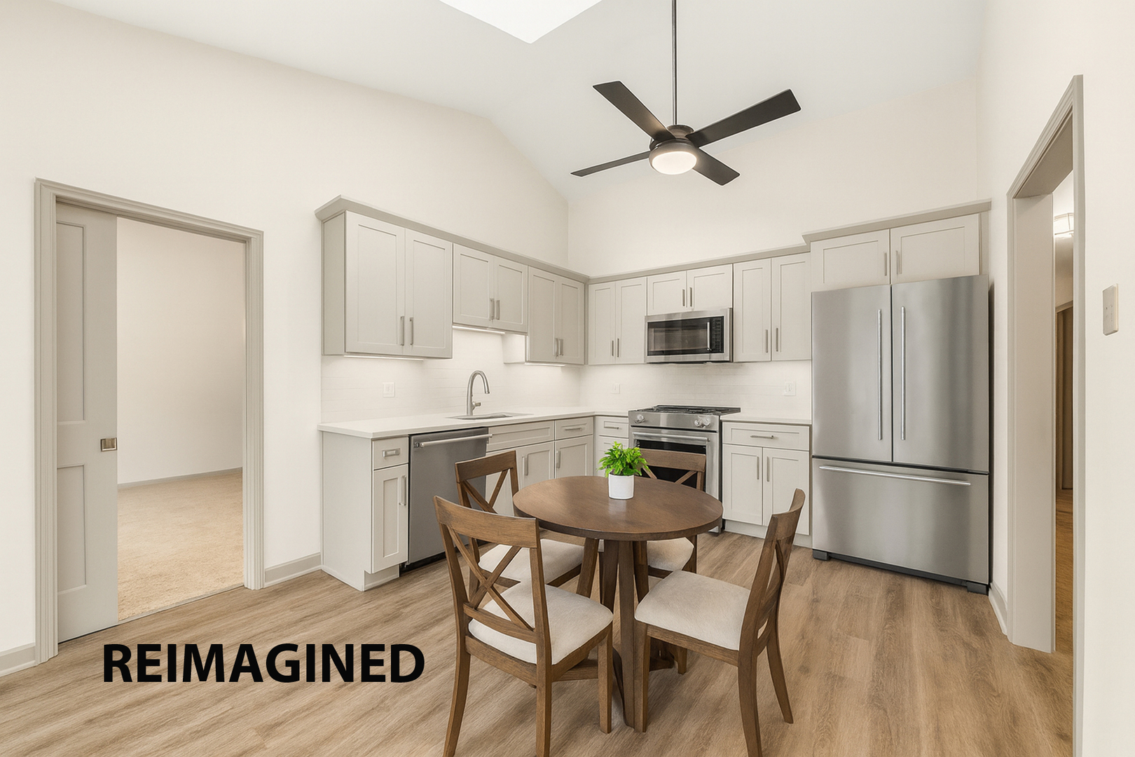 7 Douglas Drive Sugar Grove, IL 60554 - Photo 11 of 38 a kitchen with stainless steel appliances a refrigerator a stove a sink and white cabinets with wooden floor