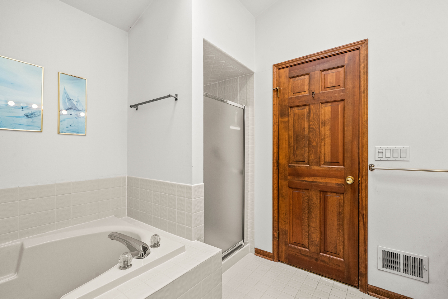 7 Douglas Drive Sugar Grove, IL 60554 - Photo 23 of 38 a bathroom with a bathtub and a shower