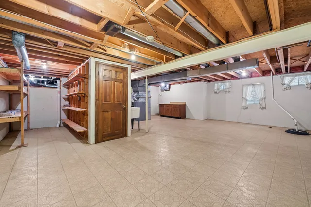 a view of an empty room with a garage