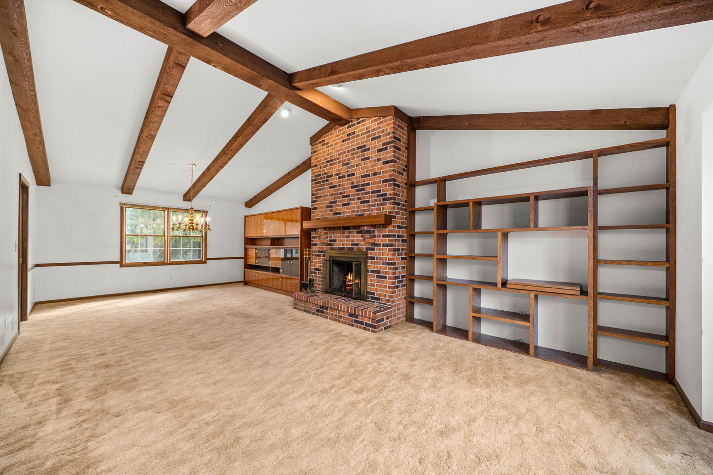 7 Douglas Drive Sugar Grove, IL 60554 - Photo 6 of 38 a view of an empty room with a fireplace