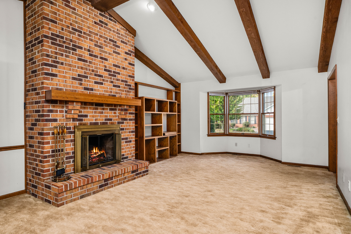 7 Douglas Drive Sugar Grove, IL 60554 - Photo 8 of 38 an empty room with fireplace and windows