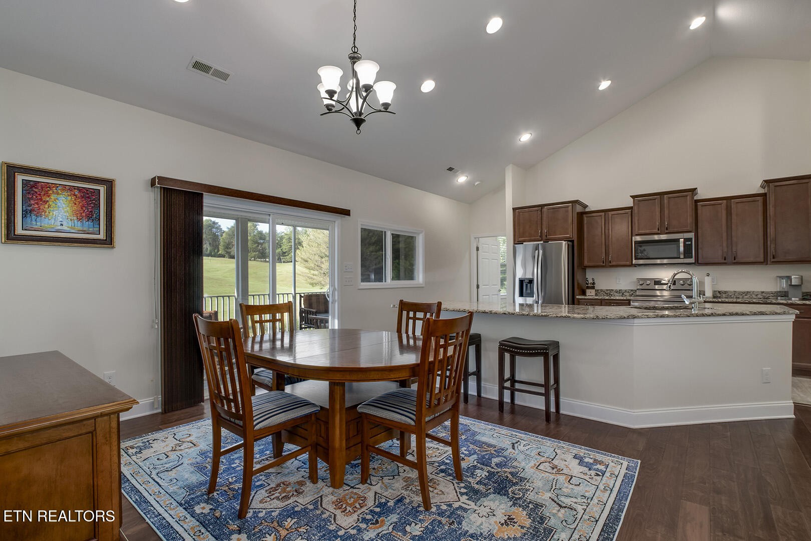 134 Daleyuhski Way Loudon, TN 37774 - Photo 12 of 54 a view of a dining room with furniture window and wooden floor