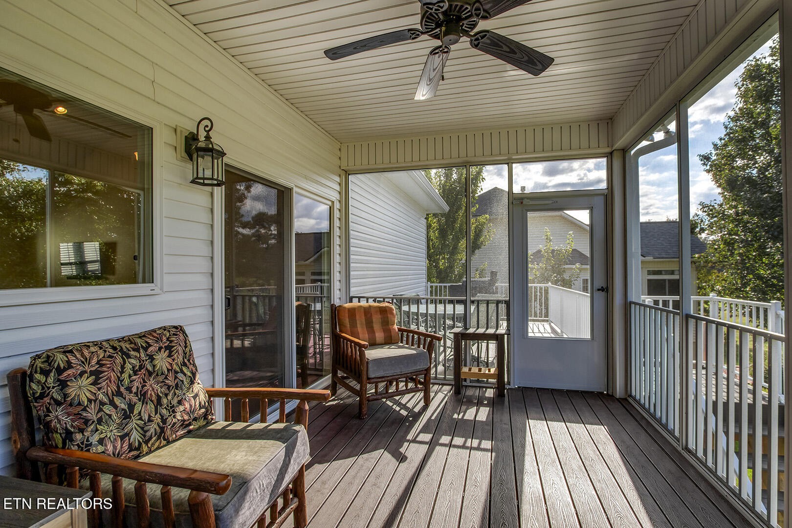 134 Daleyuhski Way Loudon, TN 37774 - Photo 15 of 54 a balcony with wooden floor and outdoor seating