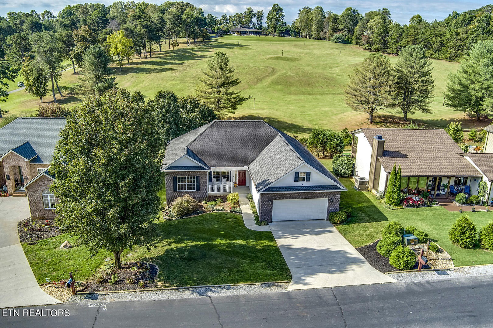 134 Daleyuhski Way Loudon, TN 37774 - Photo 2 of 54 a front view of a house with garden