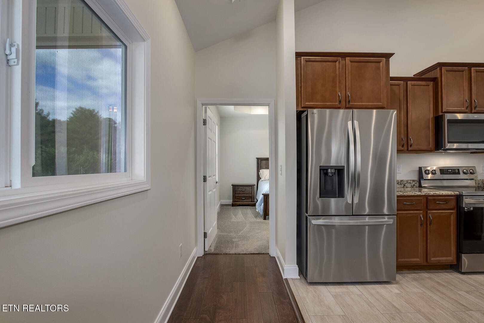 134 Daleyuhski Way Loudon, TN 37774 - Photo 26 of 54 a kitchen with a refrigerator and a sink