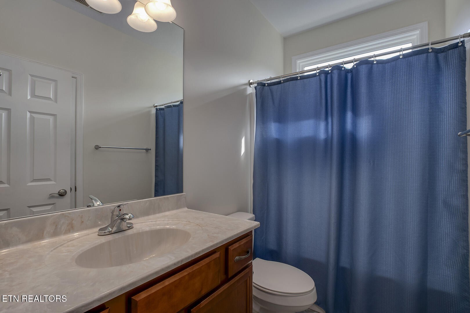 134 Daleyuhski Way Loudon, TN 37774 - Photo 36 of 54 a bathroom with a sink a toilet and shower